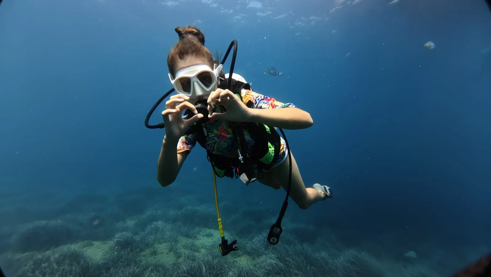 diver finning over reef alanya