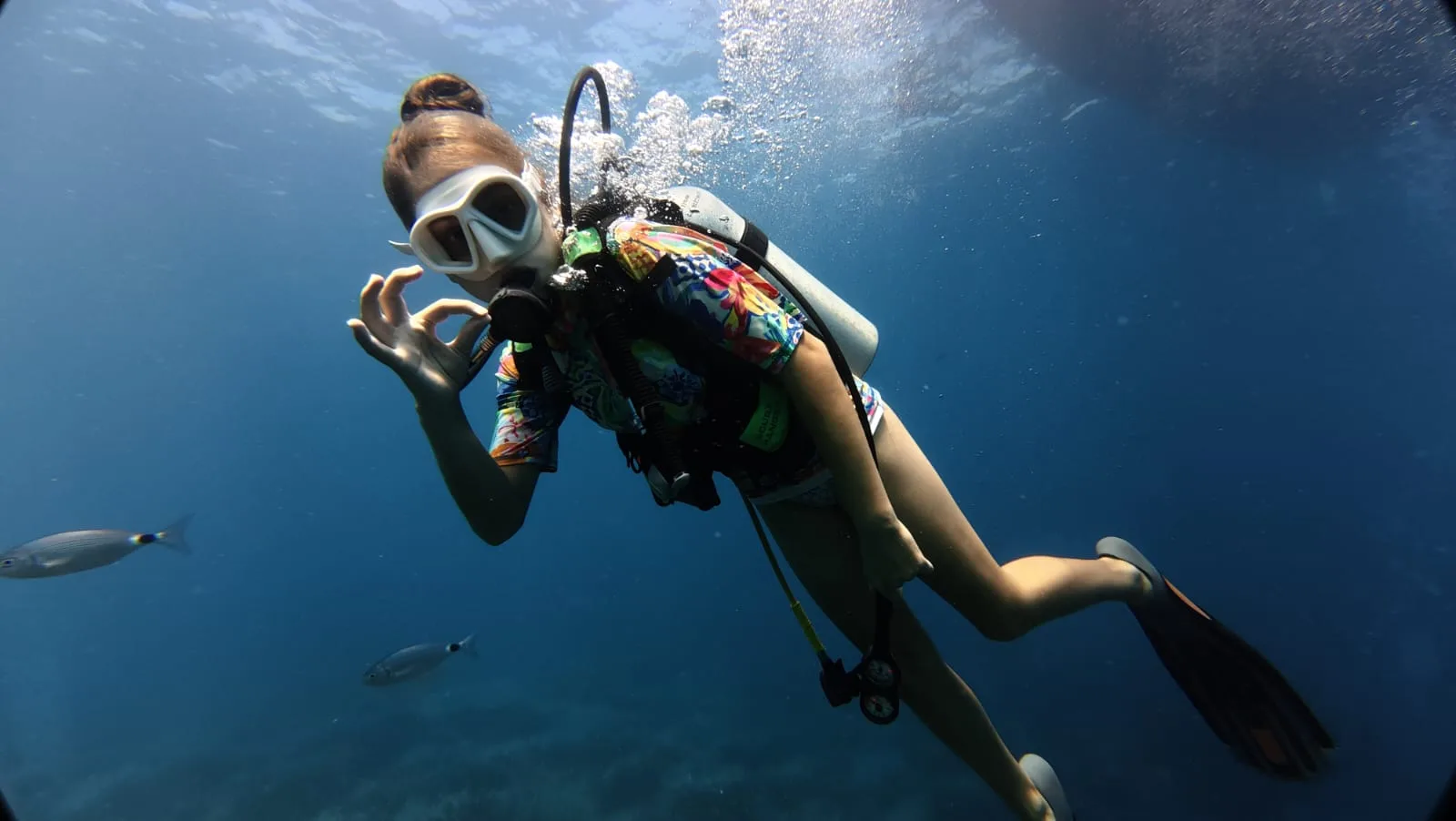 diver turning in blue alanya