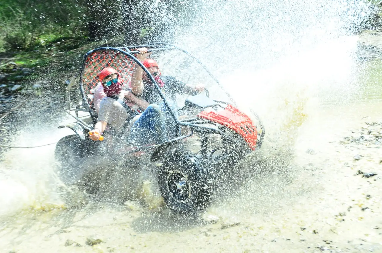 Off-road buggy sending up spray on the Belek buggy safari trail