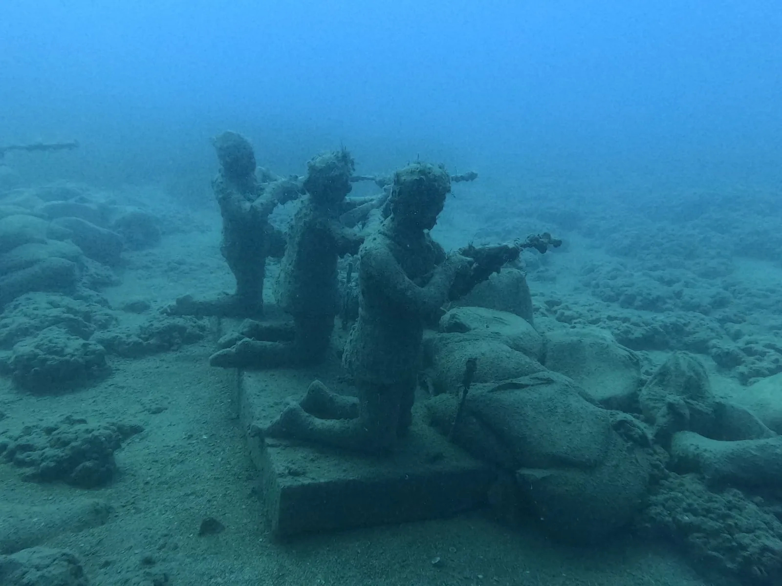 statue group blue haze museum