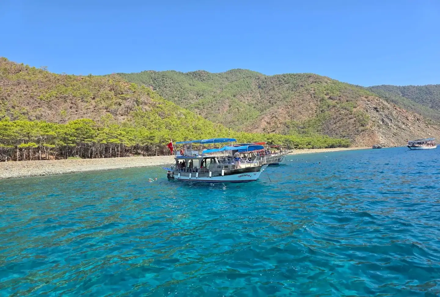 Swimming stop in Suluada's turquoise bay on the Antalya boat trip [owner]