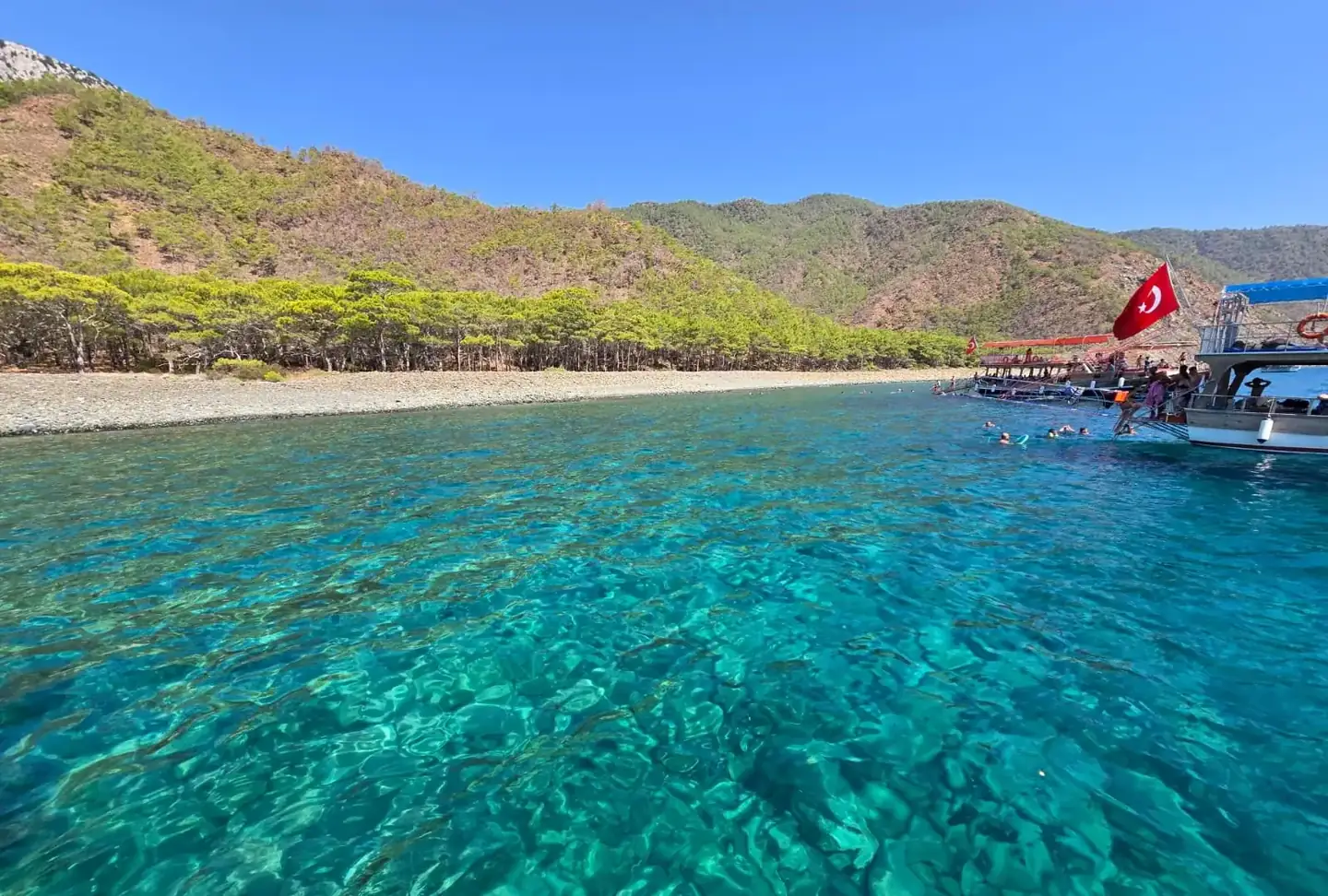 Swimming stop in Suluada's turquoise bay on the Antalya boat trip [owner]